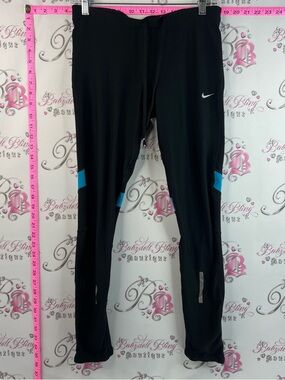 Nike Leggings / Tights with a back zipper pocket Black Printed with Blue Accents
